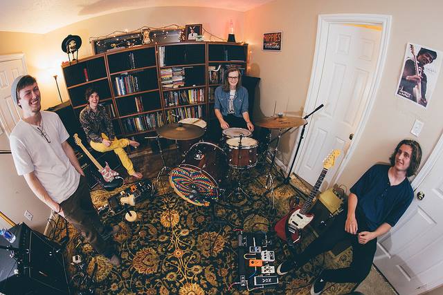 a band and their instruments shot with a fish eye lens